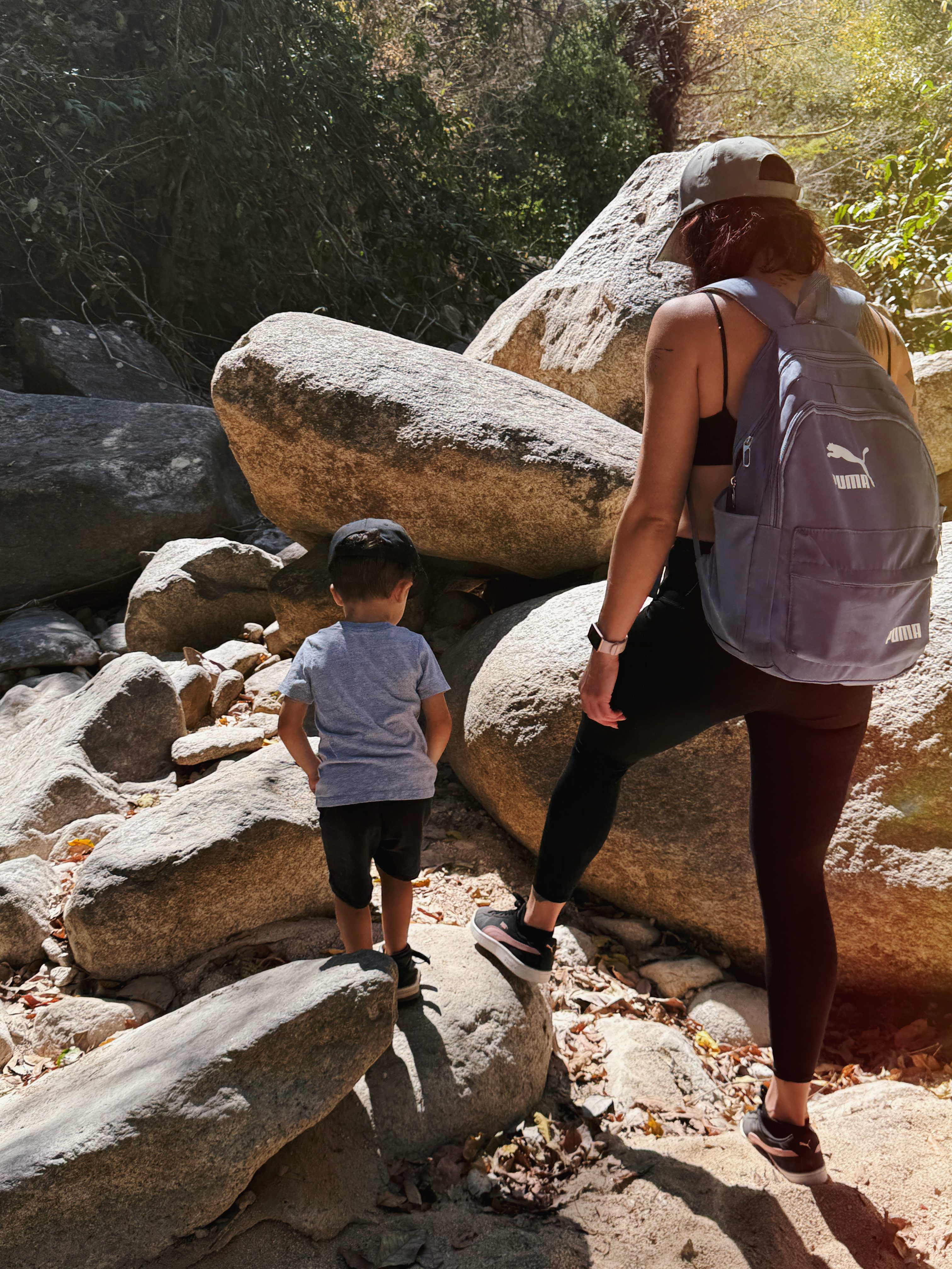 Sumi hiking with her son